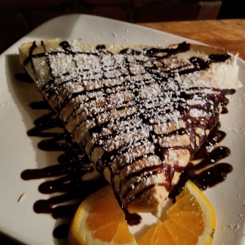 Crepes with chocolate syrup